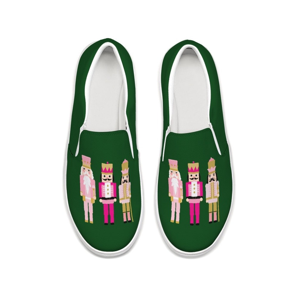 Green Stylin Brunette Christmas Slip-on Sneakers with three pink nutcrackers